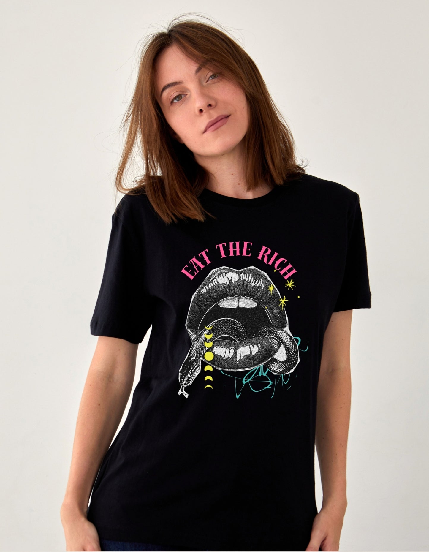 Person wearing a black t-shirt with graphic design and text